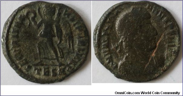 Valentinian I. 364-367AD. 
AE3. 
SECVRITAS REIPVBLICAE, Victory advancing left, holding wreath and palm.
DN VALENTINI-ANVS PF AVG, pearl diademed, draped, cuirassed bust right. 
No fieldmarks.
Mintmark TESA = Thessalonica. 