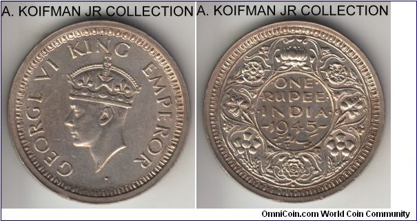 KM-557.1, 1945 British India rupee, Bombay mint (dot under flower); silver, reeded security edge; George VI, small 5 variety, common year, average uncirculated or almost, toned in places.