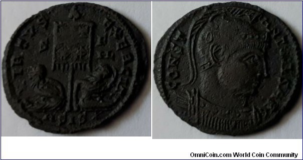 Constantine I, AE follis. 320Ad. VIRTVS-EXERCIT, standard inscribed VOT XX with a bound captive sitting left and right of the mast. S-F across fields. CONST-ANTINVS AVG, helmeted, cuirassed bust right. Mintmark ΔSIS star=Siscia. 