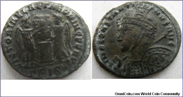 Constantine I 318Ad. AE follis. VICTORIAE LAETAE PRINC PERP, two Victories holding shield inscribed VOT PR over altar. IMP CON- STANTINVS AVG, helmeted, laureate and cuirassed bust right.
Mintmark Gamma SIS star=Siscia.