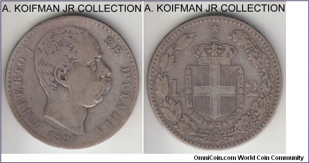 KM-23, 1887 Italy (Kingdom) 2 lire, Rome mint (R mintmark); silver, lettered edge; Umberto I, most common year, good fine or so.