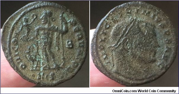 Licinius 313Ad, Follis. IOVI CON-SERVATORI, Jupiter standing left, holding victory and sceptre, eagle at foot with wreath in its beak, B to right. IMP LIC LICINIVS PF AVG, laureate head right. Mintmark SIS=Siscia.