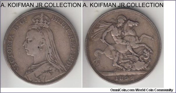 KM-765, 1892 Great Britain crown; silver, reeded edge; Victoria, last year of the Jubilee head type, smaller mintage, toned good fine, obverse has two tiny holes that someone tried to drill I think.