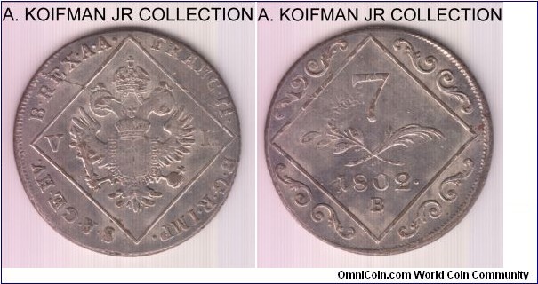 KM-2129, 1802 Austria 7 kreuzer, Kremnitz mint (B mint mark); silver, chain ornament; Franz II, struck over 1795 12 kreuzer KM-2137 with part of host coin imperial eagle visible and a die break, very fine or so, reverse better.