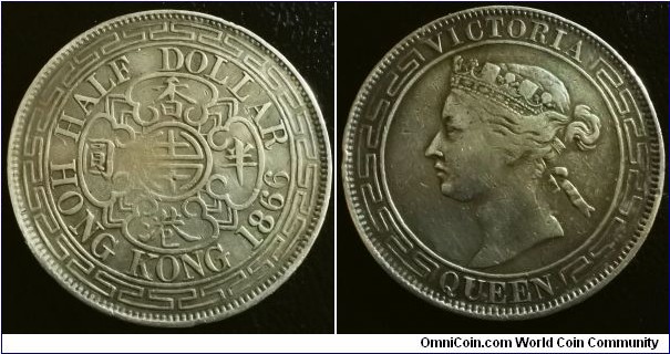 Hong Kong 1866 half dollar. Pretty uncommon these days. Very low mintage of 59,000 (with 1867 which is even scarcer). Weight: 13.39g 