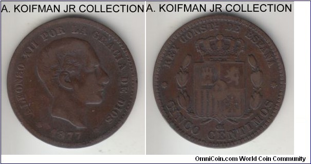 KM-674, 1877-OM Spain 5 centimos, Barcelona mint (8 star mint mark); bronze, plain edge; Alfonso XII, 3-year type, quite common, dark brown good fine or slightly better.