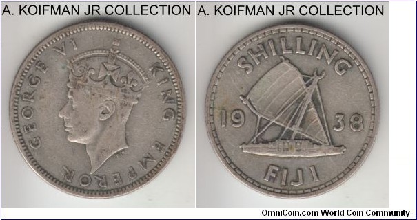 KM-12, 1938 Fiji shilling; silver, reeded edge; early George VI, small mintage year - 40,000 minted, dirty good fine.