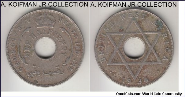 KM-8, 1934 British West Africa 1/2 penny; copper nickel, holed flan, plain edge; George V, fine details, environmental impact as common.