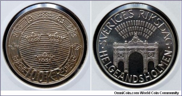 Sweden 100 kronor.
1983, Parliament Helgeandholmen. Ag 925. Weight; 16g. Diameter; 32mm. Mintage: 400.000 pcs.