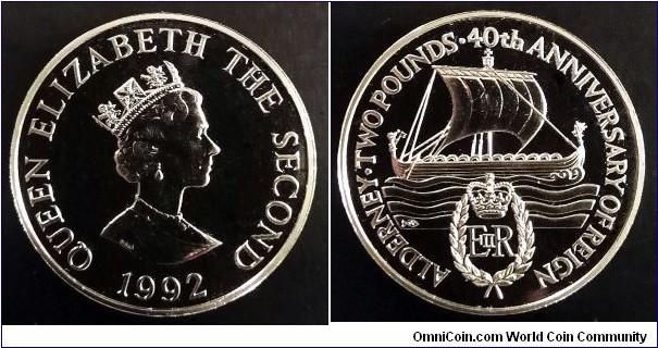 Alderney 2 pounds.
1992, 40th Anniversary of Queen's Reign. Cu-ni. Weight; 28,28g. Diameter; 38,5mm.
