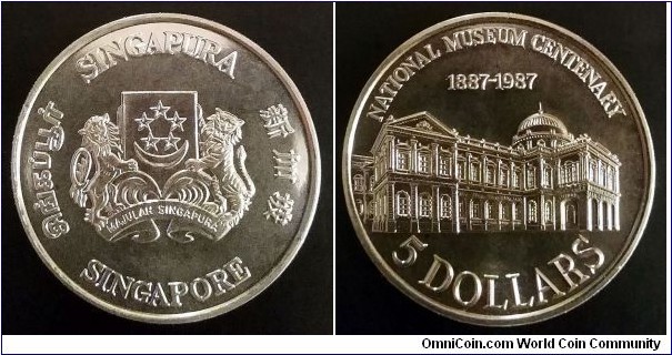 Singapore 5 dollars.
1987, 100th Anniversary of the National Museum. Cu-ni. Weight; 20g. Diameter; 38,6g. Mintage: 70.000 pcs.