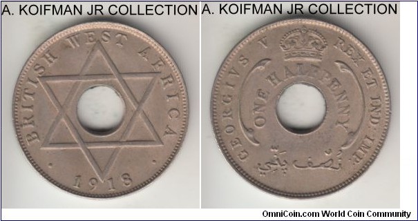 KM-8, 1918 British West Africa penny, Heaton mint (H mint mark); copper-nickel, holed flan, plain edge; George V, scarcer year, mintage 490,000, borderline uncirculated and lightly toned.