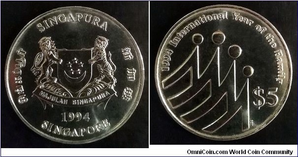 Singapore 5 dollars. 1994, International Year of the Family. Cu-ni. Weight; 20,1g. Diameter; 38,6mm. Proof-like. Mintage: 20.000 pcs. Quite scarce.