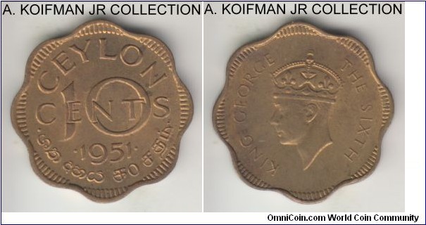 KM-121, 1951 Ceylon 10 cents; nickel-brass, scalloped flan, plain edge; George VI, 1-year type that was struck with frozen date until 1962, decent uncirculated grade.