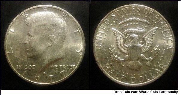 1977 D Kennedy half dollar.