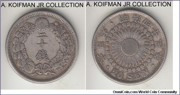 Y#30, Japan Meiji Yr.43 (1910) 20 sen; silver, reeded edge; Emperor Mutsuhito, common year, very fine or so.