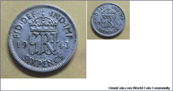 GREAT BRITAIN -
6 PENCE.

WEIGHT: 2.8276g.

COMPOSITION: 0.50000 SILVER .0455 oz.ASW.

RULER: GEORGE VI.