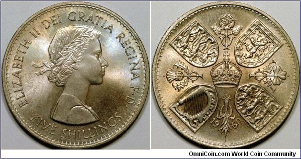 The 1960 crown or five shillings was produced for the New York Exhibition. Some of the coins, struck from polished dies, were actually struck at the exhibition. The coin shown, form normal dies was struck at the Royal Mint in London.
