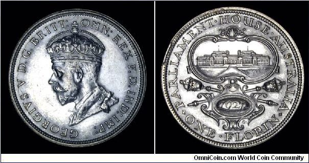 1927 Australia Florin, One year type comemmorating the opening of Parliament House in Canberra. This is the only circulation coin to use this portrait of George V.

Edge die break 9:30 to 10:00 on reverse.