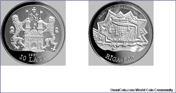 Face value: 10 lats.
Measurements: diameter 38.61 mm, weight 31.47 g.
Material: silver, fineness .925.

Obverse
Riga's coat of arms of the 17th century from a coin of King Gustav II Adolf's time is featured in the centre of the coin by matting the metal to different degrees. The year 1997, numeral 10 and inscription LATU (lats) are placed beneath the motif.
Reverse
An outline of Riga's fortifications in the first half of the 17th century is depicted in the centre of the coin by matting th