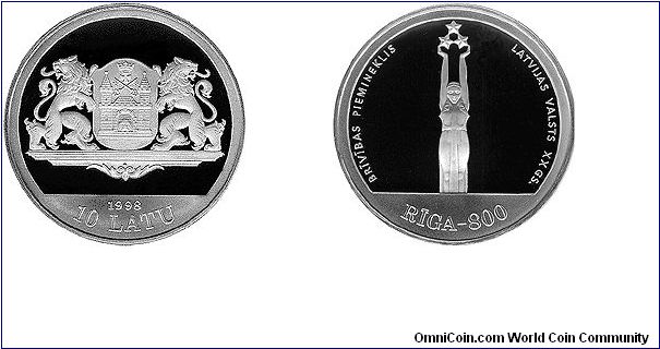 Face value: 10 lats.
Measurements: diameter 38.61 mm, weight 31.47 g.
Material: silver, fineness .925.

Obverse
Riga's coat of arms, which was adopted in 1925, is featured in the centre of the coin. The year 1998, numeral 10 and inscription LATU (lats) are placed beneath the motif.
Reverse
The statue of Liberty, which tops the Freedom Monument, is depicted in the centre of the coin. The inscriptions BRIVIBAS PIEMINEKLIS (Freedom Monument) and LATVIJAS VALSTS XX GS. (State of Latvia 20th c
