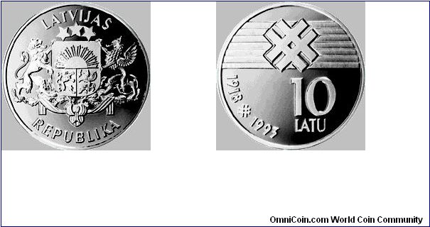 Measurements: diameter 36.07 mm, weight 25.175 g.
Material: silver, fineness .925.

Obverse
The large coat of arms of the Republic of Latvia is placed in the centre. The inscriptions LATVIJAS and REPUBLIKA, each arranged in a semicircle, are above and beneath the central motif, respectively.
Reverse
The reverse is horizontally divided into two parts. An ethnographic motif on the background of seven horizontal lines is centered in the upper part. The numeral 10, with the inscription LATU (l