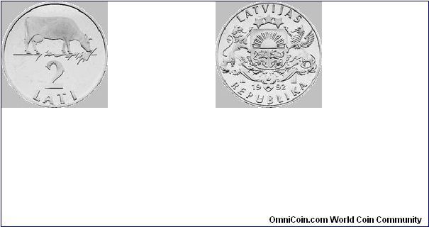 Measurements: diameter 24.35 mm, weight 6.00 g.
Material: cupro-nickel. 

Obverse
The large coat of arms of the Republic of Latvia, with the year 1992 inscribed below, is placed in the centre. The inscriptions LATVIJAS and REPUBLIKA, each arranged in a semicircle, are above and beneath the central motif, respectively.
Reverse
A grazing cow, depicted in the upper part of the coin, is a symbol of the wealth of the Latvian countryside. The numeral 2, with the inscription LATI in a semicircle