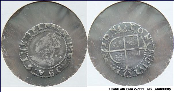 A Half Groat my best guess at the date is 1597. If anyone knows for sure please contact me.