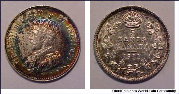 1911 Canada 5 Cents Silver.

Album toned.