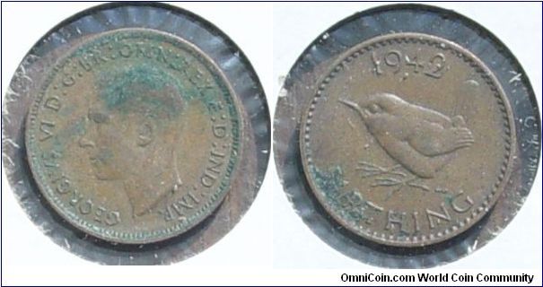 A 1942 British Farthing (One Quarter Penny) VF
Corroded
