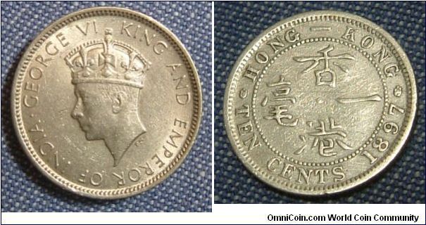 HONG KONG 1937 10 CENTS SILVER COIN. MINTED BY THE BRITISH DURING THE BRITISH COMMONWELATH ERA. FOR SALE. PLEASE MAKE AN OFFER.