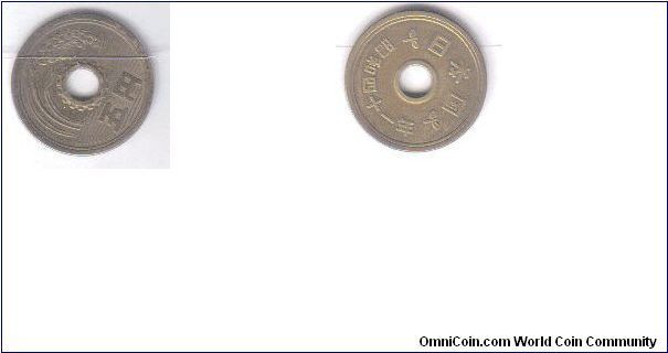 JAPAN 1941 5 YEN CUPROUS NICKEL COIN IN SHOWROOM CONDITION. FOR SALE. PLEASE MAKE AN OFFER.