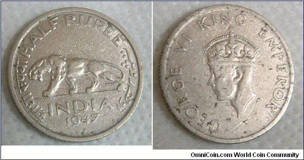 INDIA 1947 HALF RUPEE.
Very fine nickel piece bearing an image of the magnificent tiger.
For sale. Please make an offer.