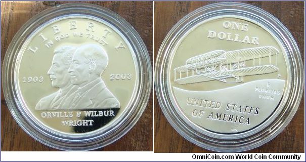 2003 First Flight Commemorative Proof Silver Dollar
Mint Philadelphia
Weight 26.73 Grams
Diameter 38.10mm
Composition 90% Silver 10% Copper
