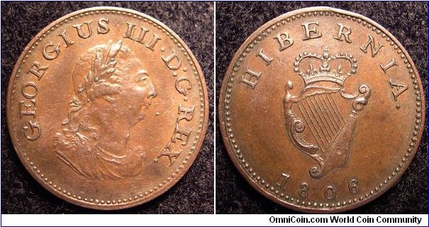 1806 XF/AU Farthing with die crack between the first I in George III. Also some metal bead like deposits from milling on obverse.