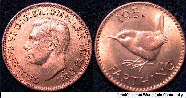 1951 British Farthing. The image does not show how red this coin is and the colours in the coin. It is a very colourful coin.