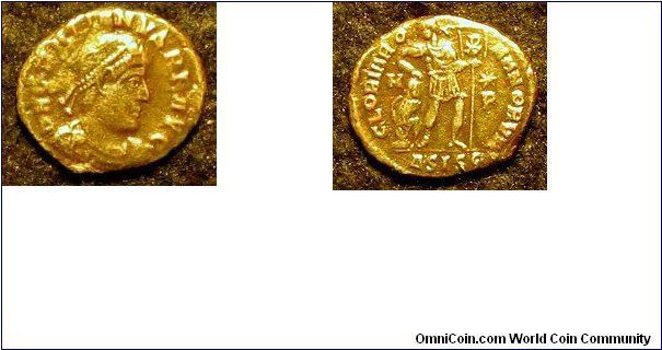 Roman
Gratian AE3 17mm
Head rt.
Emperor dragging captive holding standard
H & P about
Siscia