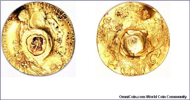 Grenada's earliest coinage consisted of counterstamped coins of other countries, usually Spanish and Spanish colonial pieces. We show here a counterstamped Brazilian gold 4000 reis with the conjoined portraits of Maria I and Petrus III of Portugal. 
This coin is unlisted in Krause.