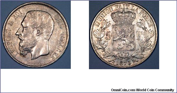 Belgium has had a history of change. It has been an independent kingdom since 1830. Our photo shows a silver five franc crown of Leopold II from 1873.