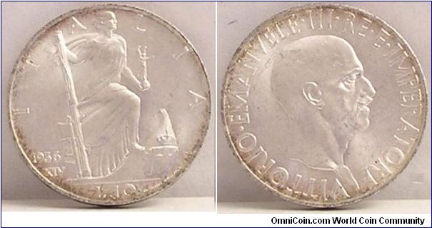 ITALY - KINGDOM. 1936-R 10 Lire. Year XIV. .835 Silver. Minted 1936-1941. Mintage: 619,000. KM#80.

Vittorio Emanuele III. Full mint frost abounds on this flashy gem.  A gorgeous design.