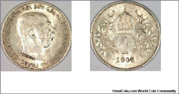 Silver 1 corona coins were issued after the monetary reform of 1892. There were three types issued. The third type with a bare head was issued from 1912 to 1916 inclusive, with a reverse design similar to the first type, a crowned figure 1 in a wreath.