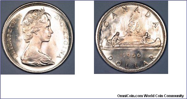 The familiar Canadian silver voyageur or canoe dollar.