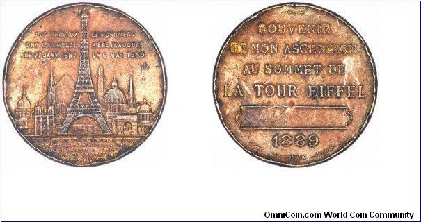 Copper or bronze Eiffel Tower souvenir medallion.