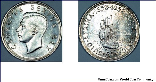 Sailing ship on reverse of George VI five shillings (crown), and the dates 1652 - 1952.