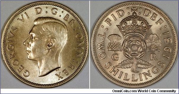George VI florin or two shillings of 1951.
This was the last date of halfcrown issued for George. Only three dates, 1949, 1950 and 1951 share the same reverse legend.