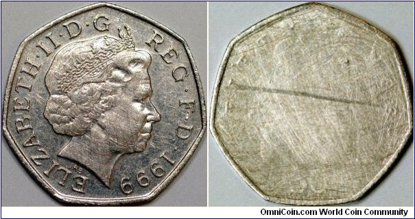 Mistrike or restrike? We are not yet sure whether this fifty pence is an error. The reverse appears blank at a quick glance, but a weak partial impression can be seen. The weight is also correct, which leads us to think it's a striking error rather than a fake.