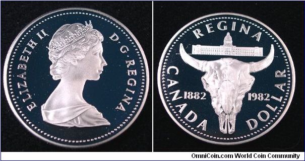 1982 Regina silver proof dollar.