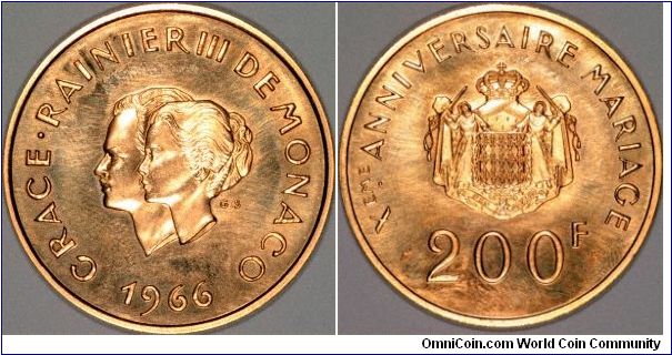 Prince Rainier's rcent death reminded us to process the photo's of this coin. Unfortunately it has greasy fingerprints all over it. It's a tenth wedding anniversary gold 200 francs with conjoined portraits of Rainier and Princess Grace (Kelly).