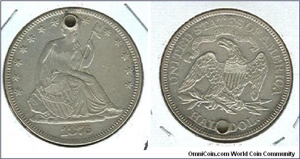1876 U.S. Half dollar, no doubt holed when still in M.S. condition, due to being worn in some way, has lost all mint luster.