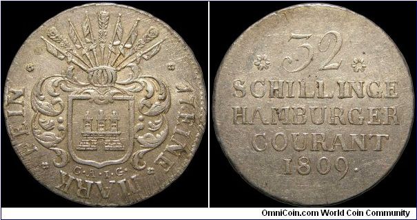 32 Shilling, Hamburg.

Adjustment marks. C. A. I. G. 
(C. A. J. Ginquembre, French director of the mint)                                                                                                                                                                                                                                                                                                                                                                                                         